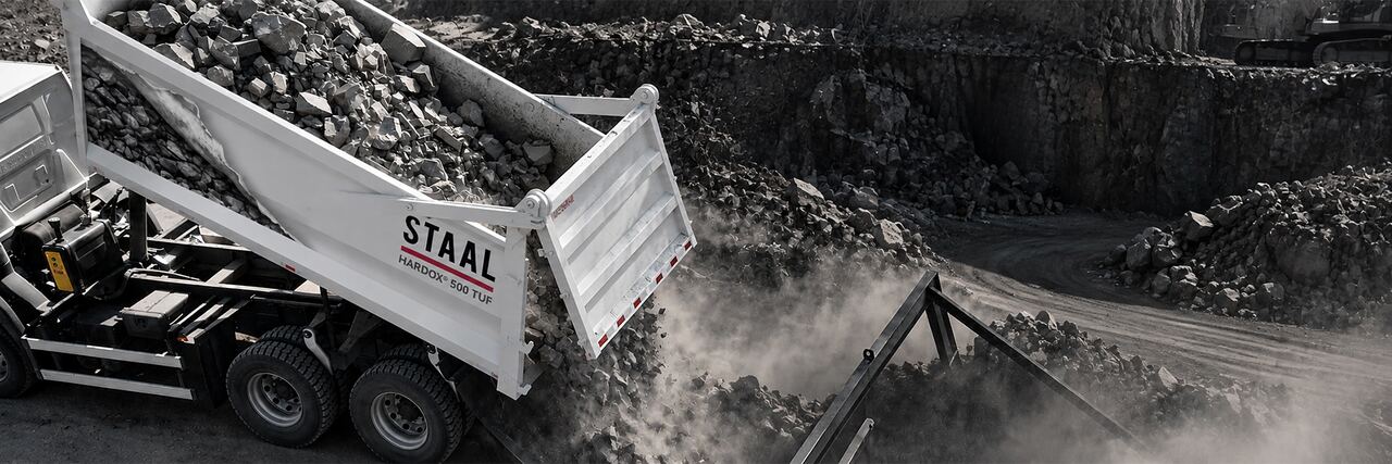 STAAL dump truck unloading at a quarry